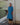 Female wearing a Turquoise Blue Solid Color   A-Line Style Round Neckline Cotton Slub Kurta