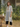 Female wearing a White Solid Color Kurta V-Neckline Neckline Mandarin Collar Shirt
