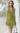 Female wearing a Green Solid Color Babydoll V-Neck Neckline Dress