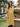 Female wearing a Yellow Solid Color Kurta V-Neckline Neckline No Collar Shirt