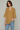Female wearing a Yellow Solid Color   Fusion Style V-Neck Neckline Cotton Slub Tunic