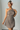 Female wearing a Pink Sanganeri, Floral Mughal Butta Print A-Line Asymmetric Neckline Dress