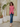 Female wearing a Peach Solid Color   Fusion Style Asymmetric Neckline Cotton Slub Tunic
