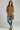 Female wearing a Mustard Solid Color   Fusion Style Boat Neckline Cotton Slub Tunic