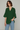Female wearing a Green Solid Color   Fusion Style V-Neck Neckline Cotton Slub Tunic