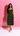 Female wearing a Emerald Green Sanganeri Pink Floral Butta Print A-Line Dress