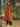 Female wearing a Orange Solid Color A-Line High Neckline Imperial Collar Kurta