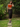 Female wearing a Orange Solid Color Western V-Neck Neckline Top