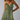 Female wearing a Green Sangeneri , Yellow Chameli Print Print A-Line V-Neck Neckline Dress