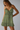 Female wearing a Green Sangeneri , Yellow Chameli Print Print A-Line V-Neck Neckline Dress