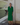 Female wearing a Green Solid Color   A-Line Style V-Neck Neckline Cotton Slub Dress