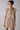 Female wearing a Beige Solid Color A-Line Sweetheart Neckline Dress