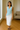 Female wearing a Ferozi Blue Solid Color Western V-Neck Neckline Top