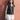 Female wearing a Black Solid Color Western V-Neck Neckline Notched Collar Top