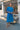 Female wearing a Ferozi Blue Solid Color   Pleated Style High Neckline Cotton Slub Kurta