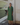 Female wearing a Green Solid Color   A-Line Style V-Neck Neckline Cotton Slub Dress