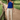 Female wearing a Blue Solid Color Fusion Halterneck Neckline Top