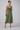 Female wearing a Green Sangeneri , Yellow Chameli Print Print A-Line V-Neck Neckline Dress