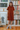 Female wearing a Rust Solid Color   A-Line Style Tucked Neckline Cotton Slub Dress
