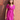 Female wearing a Pink Solid Color Empire Line V-Neck Neckline No Collar Dress