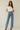 Female wearing a White Solid Color   Fusion Style Off The Shoulder Neckline Cotton Slub Top