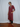 Female wearing a Rust Maroon Solid Color Empire Line Kurta
