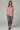 Female wearing a Pink Solid Color   Fusion Style V-Neck Neckline Cotton Slub Tunic