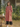 Female wearing a Muted Peach Solid Color Pleated Boat Neckline Kurta