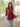 Female wearing a Maroon Solid Color Fusion V-Neck Neckline Mandarin Collar Tunic
