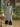 Female wearing a Sea Green Solid Color A-Line Notched Neckline Kurta