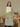 Female wearing a Yellow Sanganeri Blue Floral Print Kurta Round Neckline No Collar Shirt