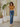 Female wearing a Mustard Solid Color   Western Style Na Neckline Cotton Slub Tunic