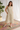 Female wearing a Grey Sanganeri, White Floral Butta  Print A-Line Slashed Neckline Open Collar  Dress