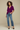 Female wearing a Purple Solid Color   Western Style V-Neck Neckline Cotton Slub Tunic