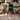 Female wearing a Green Solid Color   Babydoll Style Round Neckline Cotton Slub Dress