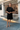 Female wearing a Black Solid Color   A-Line Style High Or Bottle Neckline Cotton Slub Dress