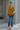 Female wearing a Yellow Solid Color   Fusion Style V-Neck Neckline Cotton Slub Tunic