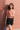 Female wearing a Peach Solid Color Western V-Neck Neckline Shawl Collar Top