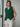Female wearing a Green Solid Color Western V-Neck Neckline No Collar Tunic