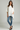 Female wearing a White Solid Color   Fusion Style Boat Neckline Cotton Slub Tunic