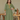 Female wearing a Green Sangeneri , Yellow Butti Print Empire Line Scoop Neckline No Collar Dress