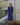 Female wearing a Blue Solid Color   A-Line Style V-Neck Neckline Cotton Slub Dress