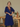 Female wearing a Blue Solid Color Kurta Notched Neckline No Collar Shirt