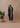 Female wearing a Black Solid Color Kurta V-Neckline Neckline Regular Collar Shirt
