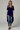 Female wearing a Purple Solid Color   Fusion Style V-Neck Neckline Cotton Slub Tunic