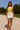 Female wearing a Yellow Solid Color Western Asymmetric Neckline Top