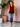 Female wearing a Red Solid Color   Fusion Style V-Neck Neckline Cotton Slub Tunic
