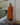 Female wearing a Rust Solid Color   A-Line Style Round Neckline Cotton Slub Kurta