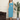 Female wearing a Ferozi Blue Solid Color Babydoll Square Neckline Dress