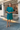 Female wearing a Ferozi Blue Solid Color   A-Line Style High Or Bottle Neckline Cotton Slub Dress